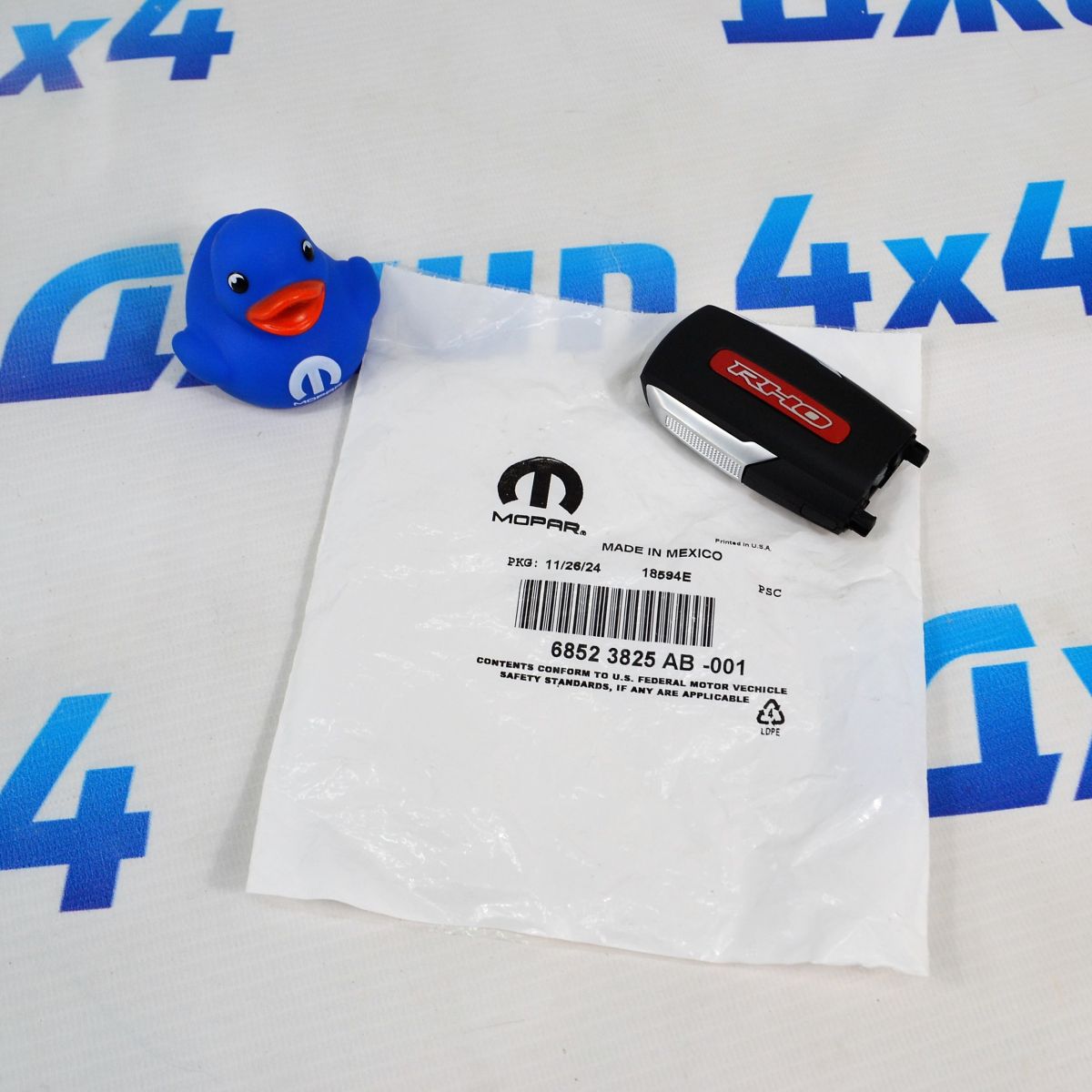 Ключ зажигания Dodge Ram RHO 68523825AB