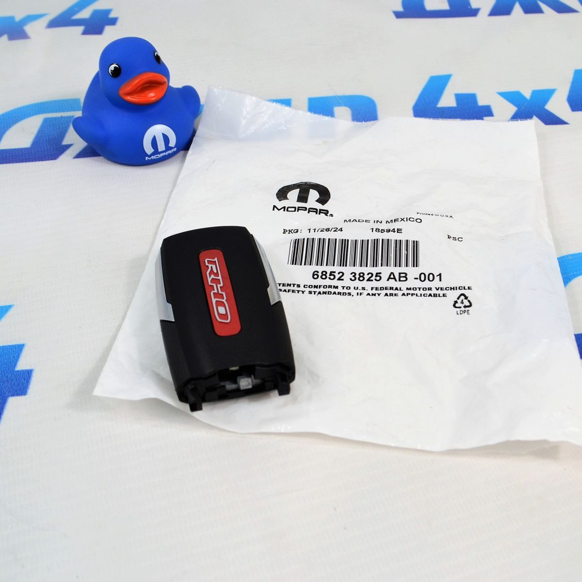 Ключ зажигания Dodge Ram RHO 68523825AB