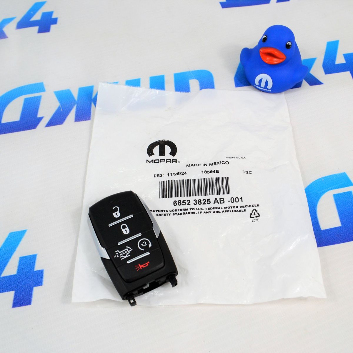 Ключ зажигания Dodge Ram RHO 68523825AB