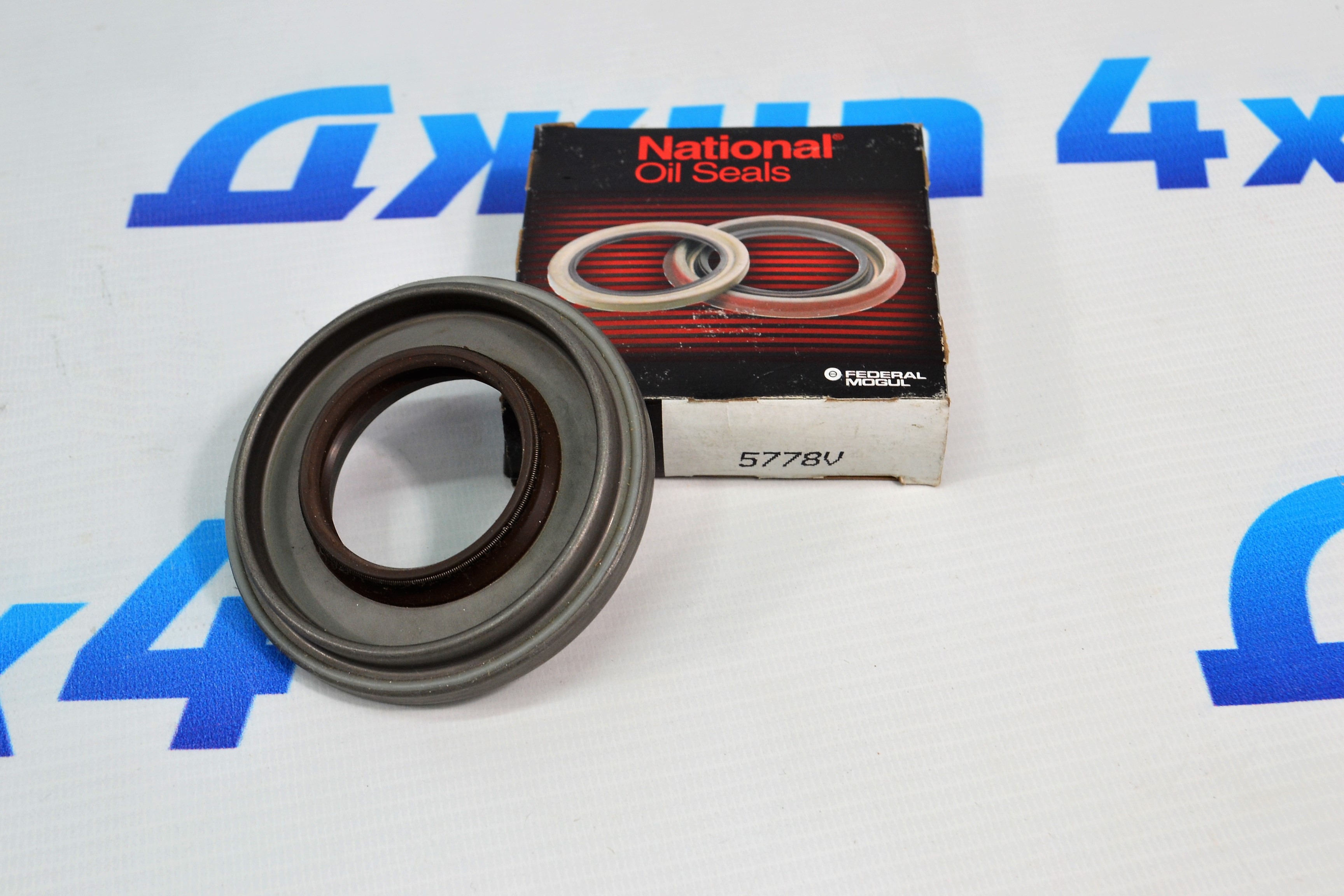 Сальник хвостовика переднего дифференциала Jeep Grand Cherokee WJ 1999-2004 5012454AA