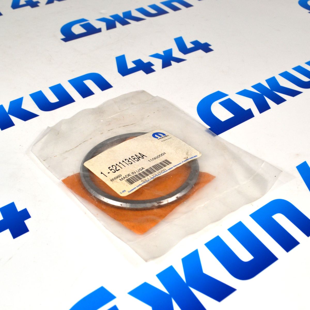 Шайба регулировочная хвостовика переднего дифференциала Jeep Grand Cherokee 52111316AA